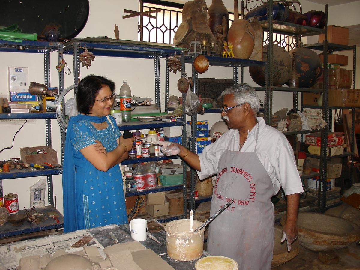 Premilla Baid with artist K. Laxma Goud at the ceramics camp in 2007. Premilla Baid with artist K. Laxma Goud at the ceramics camp in 2007.